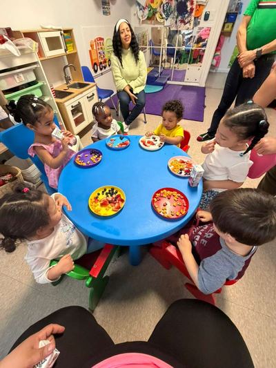 Children eating together around the table